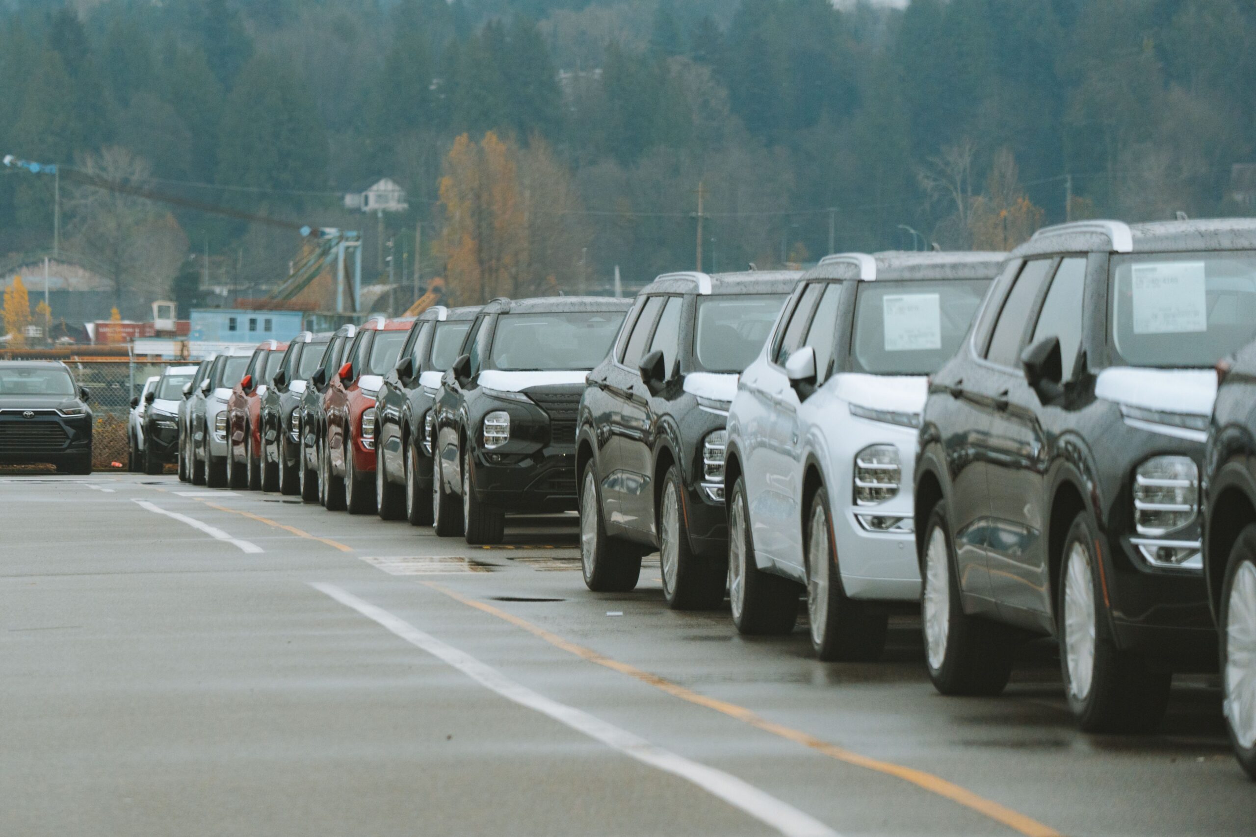 Rows of new SUVs parked on a dealership lot