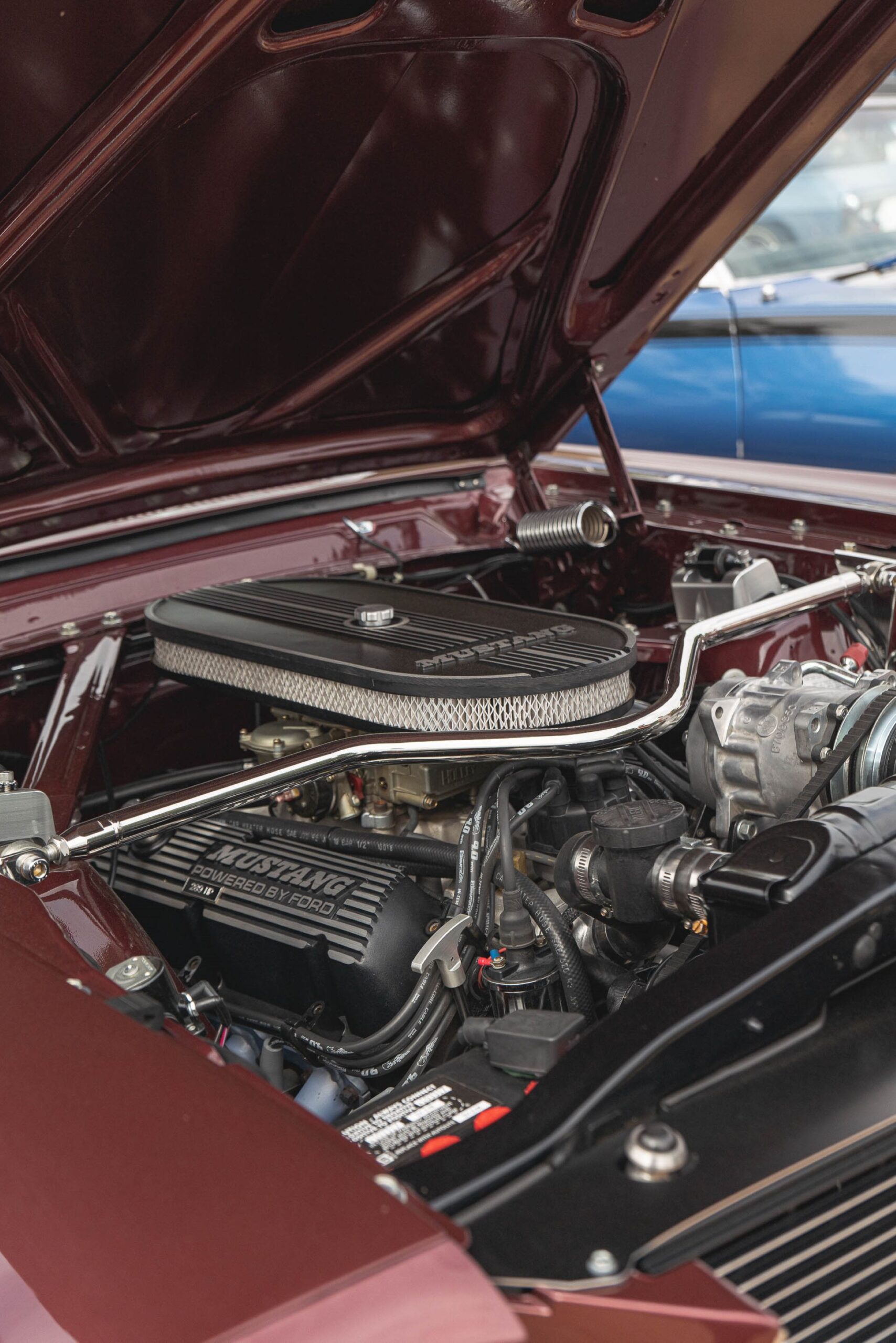 Close-up of a Mustang V8 engine bay with valve cover detail