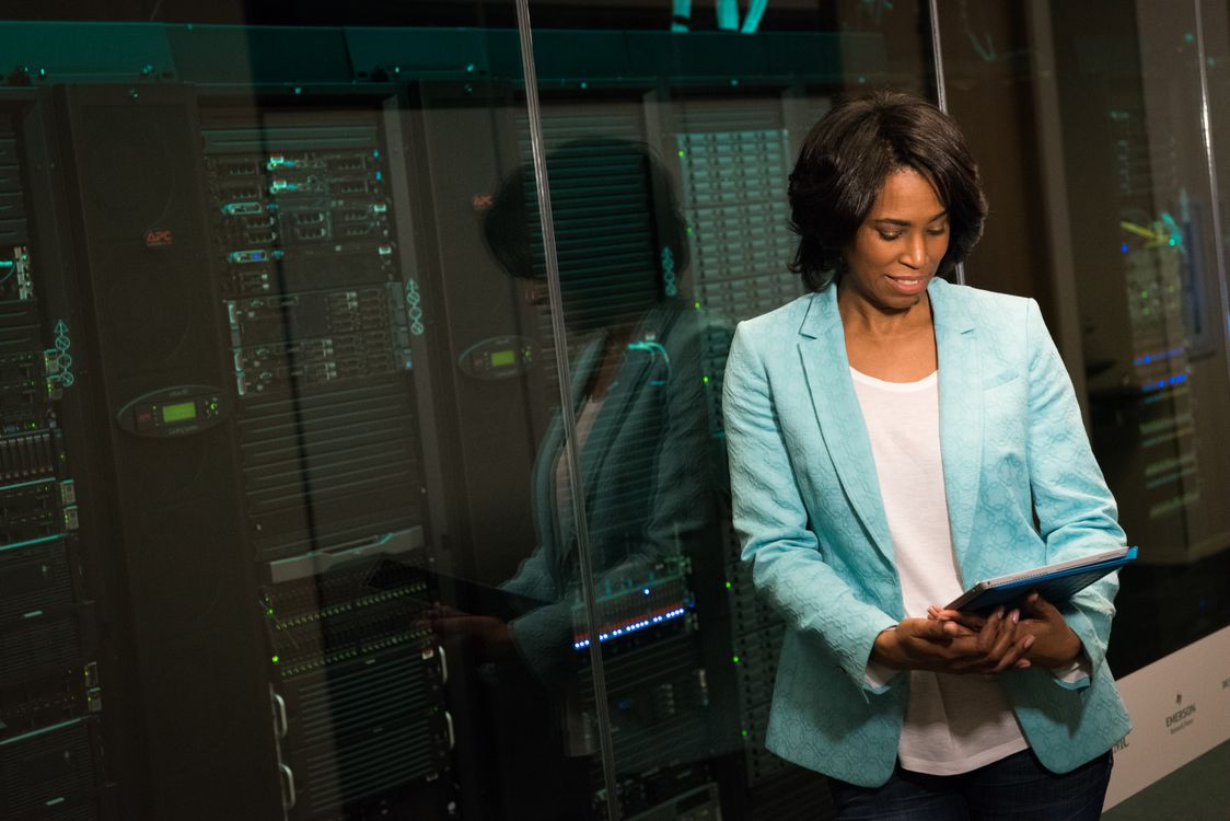 IT professional managing servers in a data center during hypervisor comparison evaluation